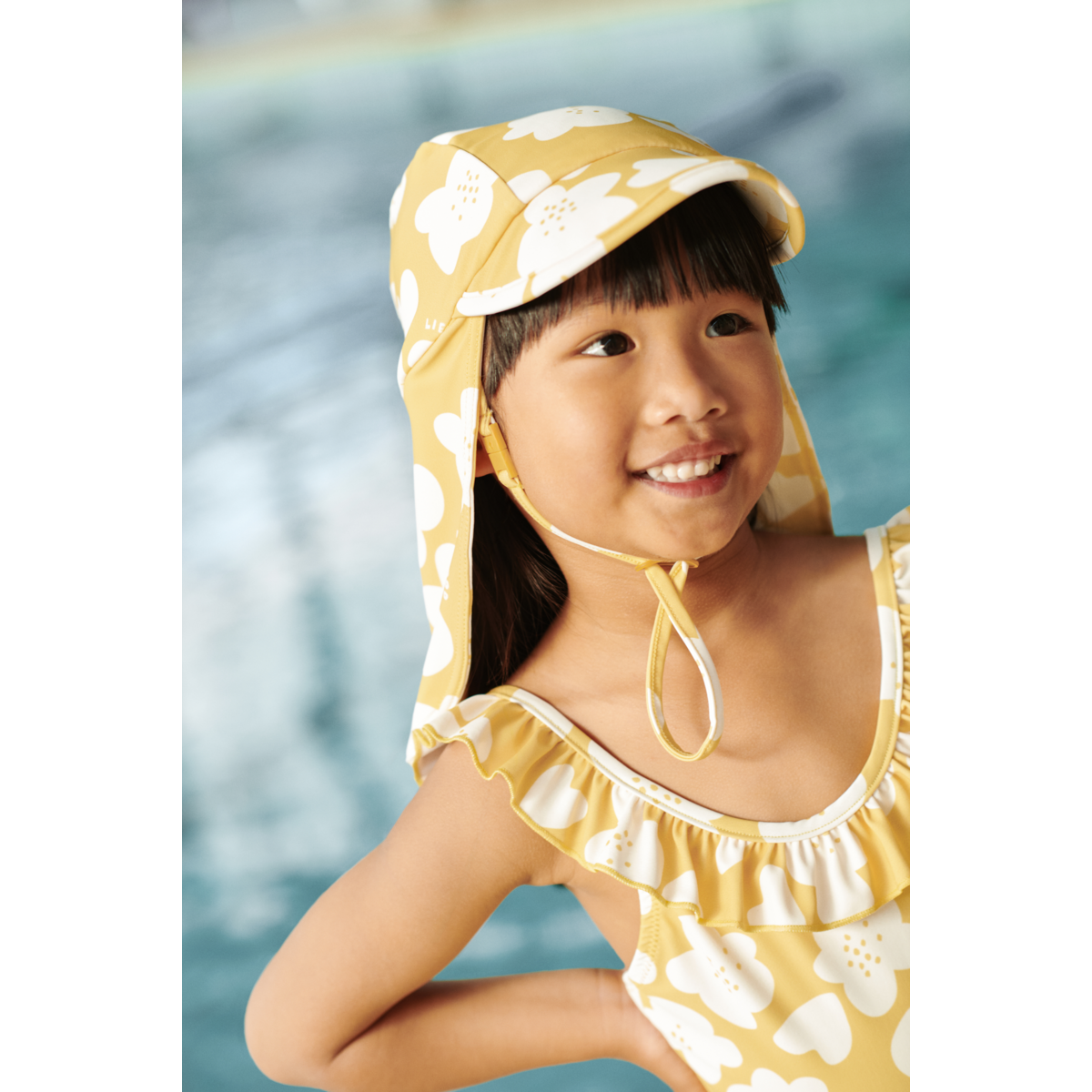 Liewood Kallie printed ruffle swimsuit - Flower / Lemon yellow - SWIMSUIT