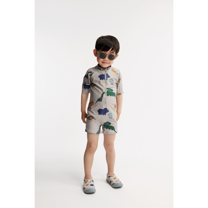 Liewood Max short-sleeved UV jumpsuit - Dinosaurs / Mist - SWIMSUIT